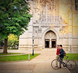 Woman riding bicycle in city