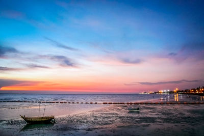 Scenic view of sea at sunset