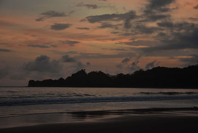 Scenic view of sea against sky at sunset