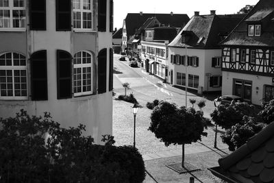 High angle view of street amidst buildings in city