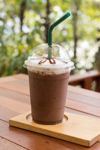 Close-up of iced coffee on table