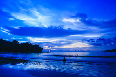 Scenic view of sea against sky at sunset