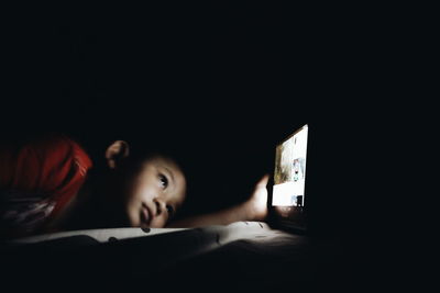 Portrait of a girl sleeping on bed at home