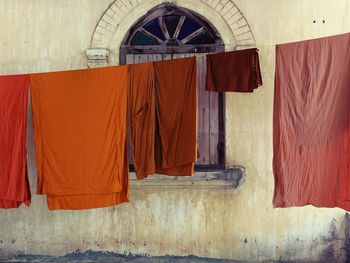 Clothes drying against the wall