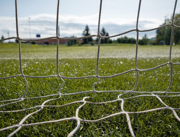 Football sport and equipment concept. close up of football goal on field