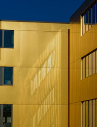 Low angle view of yellow building