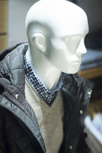 Close-up of jacket displayed on mannequin in store