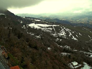 Scenic view of mountains against sky during winter