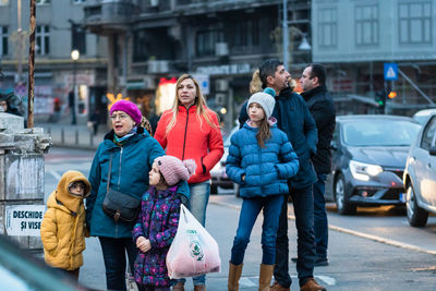 People walking on street in winter