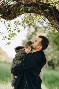 Father and son on tree