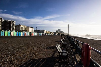 Scenic view of beach against sky in city