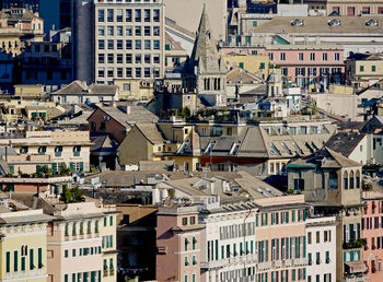 The roof of an ancient religious building in stone and slate in the historic center of the genoa.