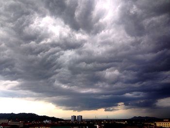 Storm clouds over city