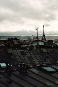 High angle view of buildings in city against sky