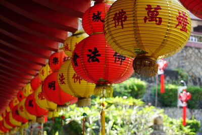 Lanterns hanging in row