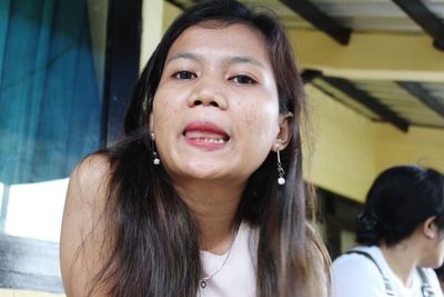 Portrait of smiling young woman