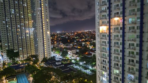 Illuminated buildings in city at night