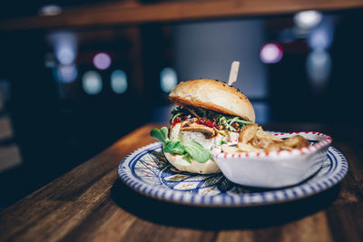 Close-up of burger in plate on table