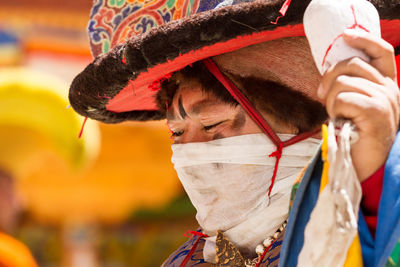 Close-up portrait of man wearing hat