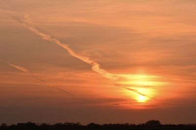 Scenic view of dramatic sky during sunset