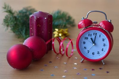 Close-up of clock on table