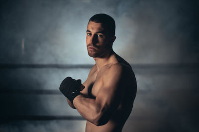 Portrait of muscular man at gym