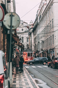 People on street in city