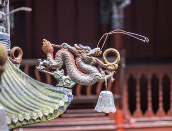 Close-up of statue against blurred background