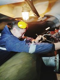 Man working with umbrella