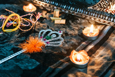 High angle view of burning candles