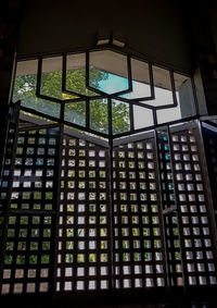 Low angle view of glass window in building