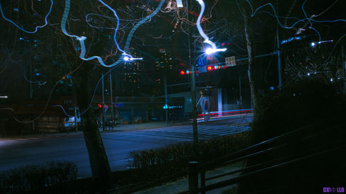 Light trails on city street at night