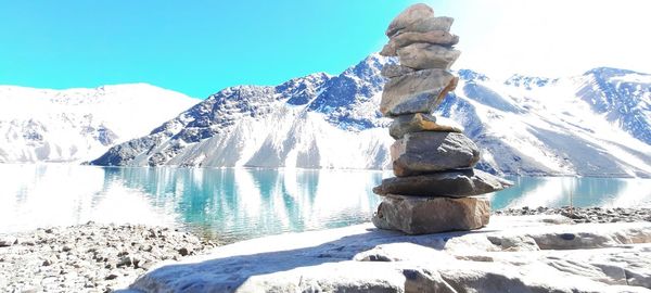 Scenic view of snowcapped mountains against clear sky