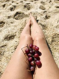 High angle view of woman on sand at beach