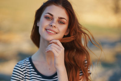 Portrait of smiling young woman