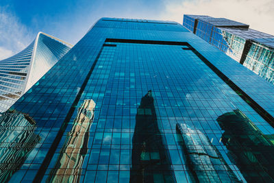 Low angle view of modern building against sky