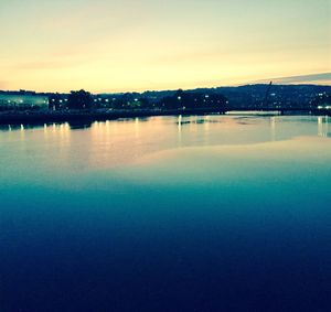 Scenic shot of calm lake at dusk