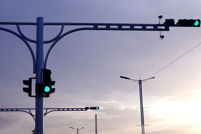 Low angle view of street light against sky