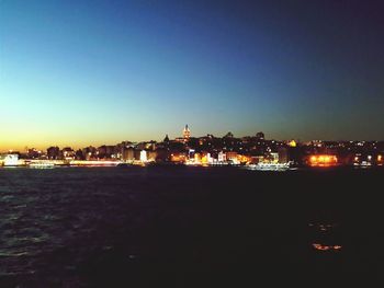 Illuminated cityscape at night