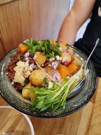 High angle view of salad in bowl on table