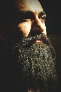 Close-up portrait of man at night