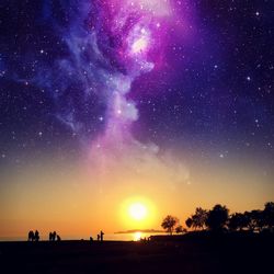 Scenic view of silhouette trees against sky at night