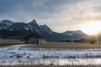 Scenic view of snowcapped mountains against sky during winter