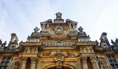 Low angle view of historic building against sky