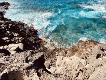 High angle view of rocks on beach in lanzarote 