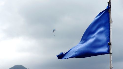 Close-up of flag against sky