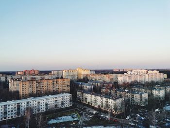 High angle view of buildings against clear sky