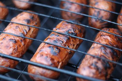 Close-up of meat on barbecue grill