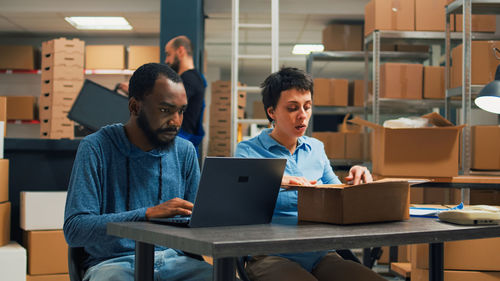 Man using laptop at office