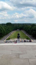 High angle view of cars on road against sky